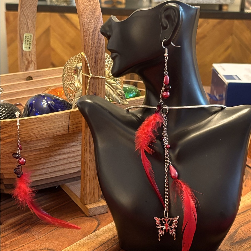 Fun and flirty feather and butterfly pendant necklace with silver chain